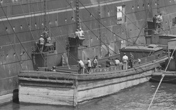 Coal trimmers bunkering a ship