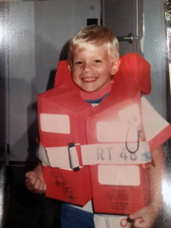 Billy wearing life vest