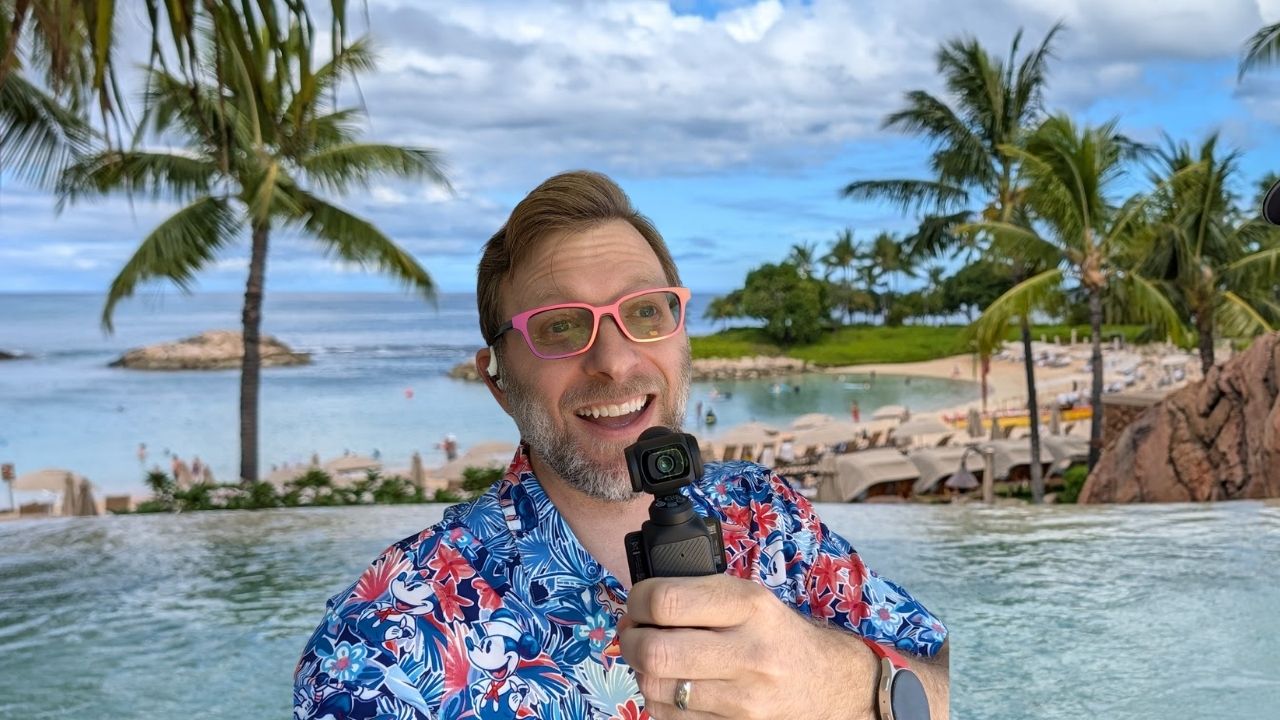 Billy at Aulani in Hawaii holding camera