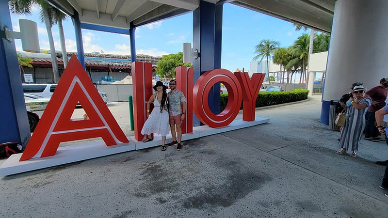 Billy & Larissa at AHOY sign in port miami