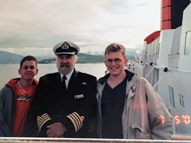 My brother John and I with Commodore Ronald Warwick, Master, QE2