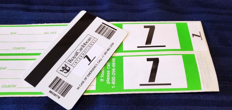 Departure Tags with Number Stuck to Back of Cruise Card (Seapass)
