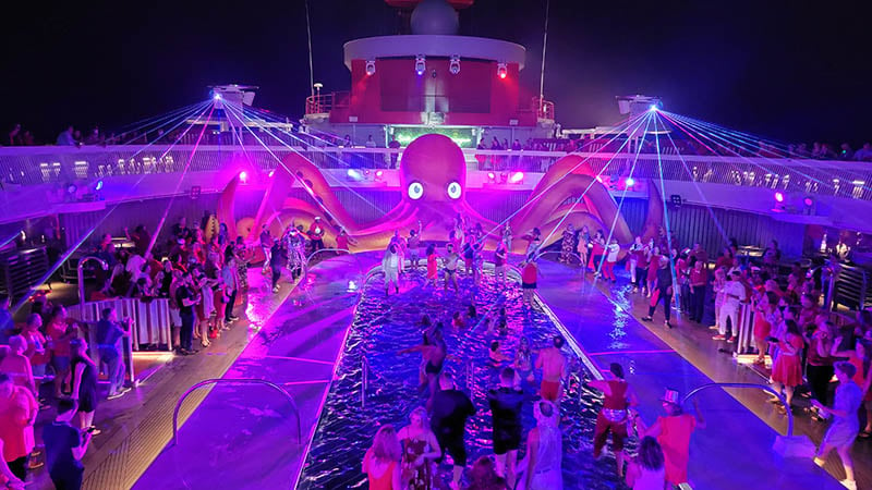 crazy party by the pool on virgin voyages - scarlet night
