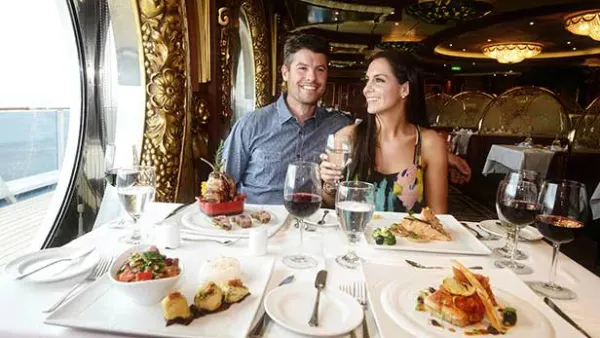 Couple enjoying wine in cruise ship dining room