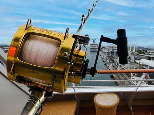 fishing reel on cruise ship balcony