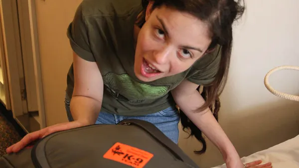 This was our bag, delivered to our stateroom with a sticker indicating it was inspected by a K9.